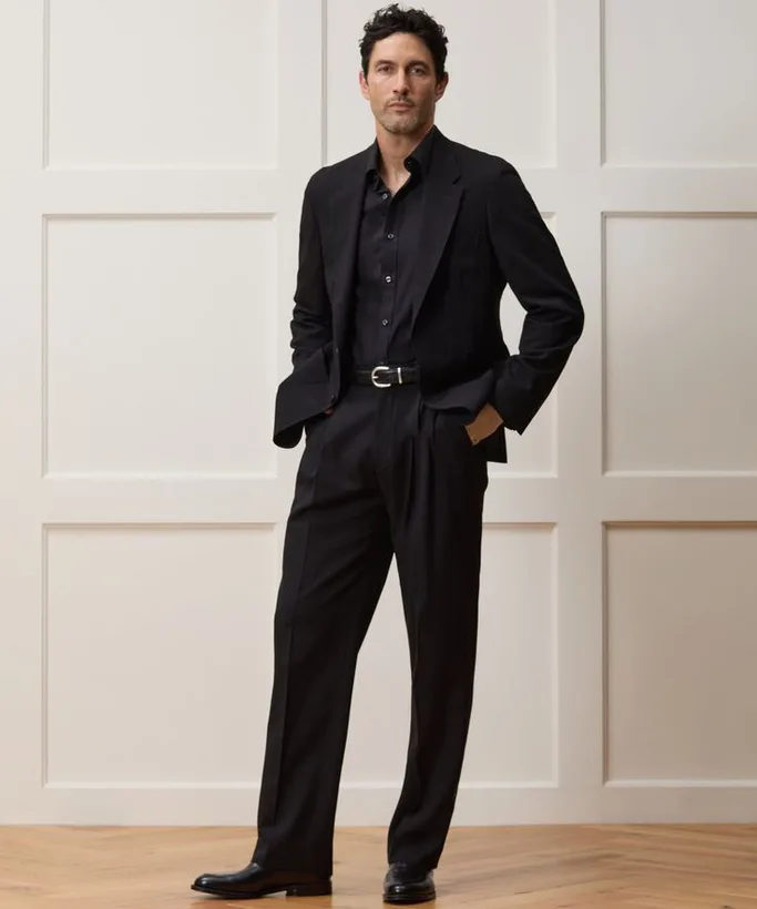 Black suit with a black shirt